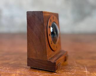 This lot features an Art Deco style 8-day clock manufactured by Seth Thomas in good working condition.