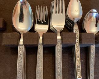 several sets and partial sets of flatware