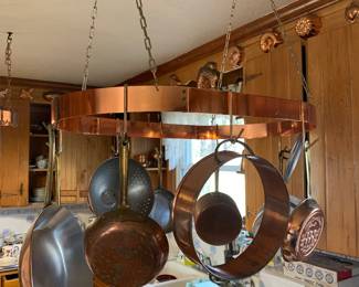 copper hanging rack and copper pots and pans