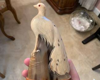 carved horn peacock