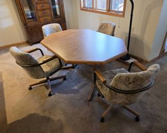 Dining Table And 4 Swivel Rolling Chairs