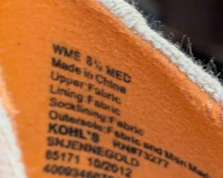 Women's shoes are size 8 1/2