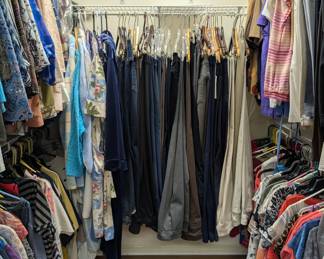 FULL WOMEN'S WALK IN CLOSET