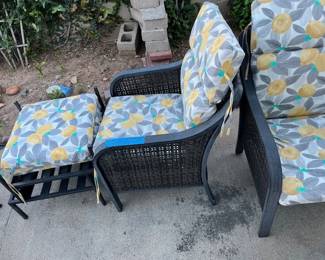 set of two outdoor chairs with foot rest, includes cushions