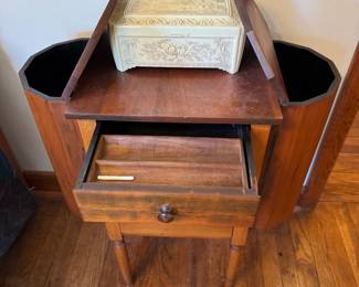 main floor bedroom with bed in it. down hallway to the right.