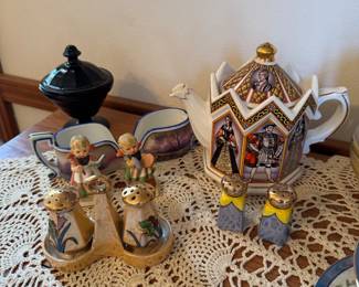 main floor bedroom with bed in it. down hallway to the right.