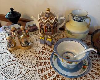 main floor bedroom with bed in it. down hallway to the right.