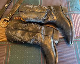 main floor bedroom with bed in it. down hallway to the right.