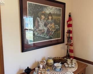 main floor bedroom with bed in it. down hallway to the right.