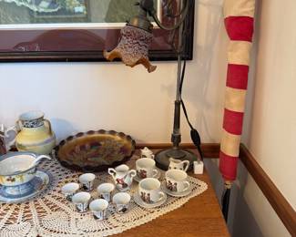 main floor bedroom with bed in it. down hallway to the right.