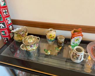 main floor bedroom with bed in it. down hallway to the right.