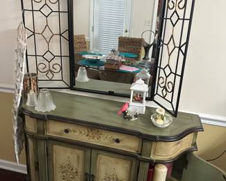 Gorgeous handpainted world so table whatever meets your decor needsItem measures 45 inches across at widest point and 35 inches in height has drawer and doors that open up with shelf inside and plenty of space to store items. 