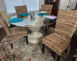 Pedistal table 25ʺW × 22ʺD × 34.75ʺH 4 ratan chairs