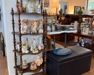 Shelf with lots of angels/figurines
