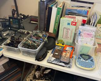 Office supplies, reading glasses, sunglasses