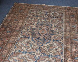 Antique Persian rug in rare brown tones, garage