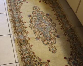 Hand woven Persian rug, master bathroom