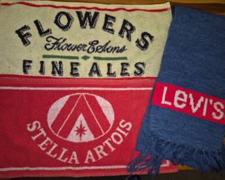 Advertising collectibles. "Levi", "Stella Artois" and "Flowers Fine Ales" towels