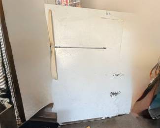 Refrigerator with freezer on top