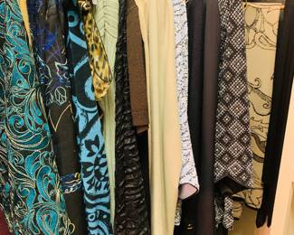 Two closets filled with nice ladies size medium clothing