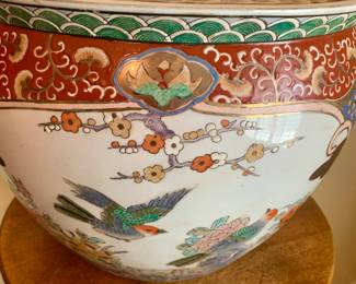 one of two ceramic fish bowls