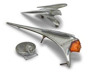2102 Three vintage automobile exterior accessories Early/mid-20th century Comprising a Pontiac chief hood ornament (5.125" H x 2.875" W x 17.5" D), a Chrysler Flying Bird hood ornament (4.25" H x 6" W x 10.75" D), and a Pontiac Indian radiator cap (2.375" H x 4.25" W x 3.375" D) 3 pieces Estimate: $300 - $500