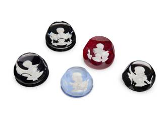 2106 A group of five sulphide glass portrait paperweights Mid/late 20th century Three with Baccarat stencil mark, each Caesar further marked: The Franklin Mint © 1976; Napoleon dated: 1974; one etched: CR ALBRET / FRANCE Comprising three Baccarat black glass, one depicting Napoleon Bonaparte and two depicting Julius Caesar, one Cristal D'Albret red glass depicting Ernest Hemingway, and one blue glass depicting Benjamin Franklin 5 pieces Each: 2" H x 2.875" Dia. approximately Estimate: $400 - $600