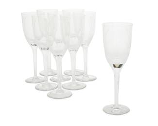 2010 A set of nine Lalique glass 'Ange' champagne flutes Late 20th century Each etched: Lalique ® France 9 pieces Each: 8.125" H x 2.75" Dia. Estimate: $400 - $600
