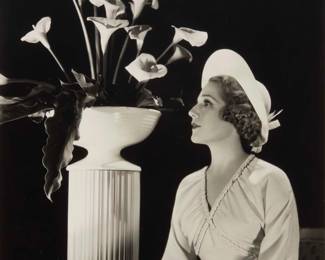 2373 George Hurrell (1904-1992) Portrait of Mary Pickford with calla lilies Gelatin silver print on paper With the artist's "Please Credit Hurrell" faint black ink stamp, verso Image: 9.375" H x 7" W; Sight: 9.625" H x 7.25" W Estimate: $200 - $300