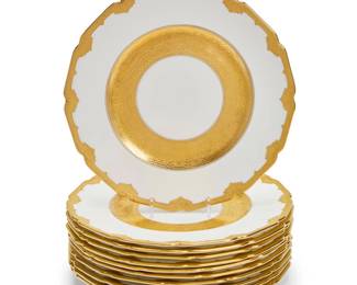 2022 A set of eleven Royal Doulton porcelain dinner plates Date codes for 1908-09 Each stamped to underside: Royal Doulton / England; further marked with puce-printed factory mark, impressed date codes, and painted pattern: HB6778/E4637 Each with pebbled gilt rims on white ground 11 pieces Each: 10.5" Dia. Estimate: $300 - $500