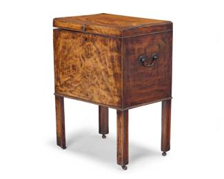 2079 A George III mixed wood cellarette Late 18th/early 19th century The locking hinged top opening to reveal an interior fitted with six metal-lined inserts 26" H x 19" W x 14.75" D Estimate: $400 - $600