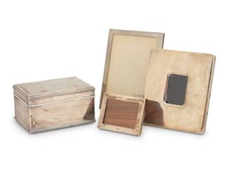 2002 Two Tiffany sterling silver frames and a Dutch sterling silver box Two works:  Two Tiffany & Co. sterling silver picture frames, mid-20th century Each with impressed factory marks; larger marked: [copyright symbol] / Elsa Peretti / 925 / Italy / [star] 1372 Fl; smaller marked: Sterling Each unadorned, comprising one Elsa Peretti easel-back, and one with wood wedge back Larger: 5.5" H x 6.25" W x 0.75" D; Aperture: 1.5" H x 2.25" W; Smaller: 2.875" H x 3.75" W x 1.25" D; Aperture: 2" H x 2.875" W 2 pieces  A Dutch sterling silver vanity box, 1830 With impressed hallmarks, Rotterdam assay office, and indecipherable maker: [star] / JCH With felted underside 3.125" H x 5.75" W x 4.25" D  Together with: A Lunt nickel silver frame, late 20th century Impressed: Lunt / M-0157 Aperture: 6.25" H x 4.25" W; Overall: 7.125" H x 5.125" W x 0.625" D  4 pieces total Total weighable sterling: 24.9 gross oz. troy approximately Estimate: $1,000 - $1,500