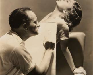 2367 George Hurrell (1904-1992) McClelland Barclay drawing Helene Barclay, 1932 Photograph on paper From the edition of unknown size Embossed in the lower right margin: "Hurrell"; Inscribed in pencil and with an ink date stamp, both verso: "Helen [sic] Barclay & / McClelland Barclay, magazine / cover artist. / May 31 1932" Sight: 9.25" H x 7.25" W Estimate: $200 - $300