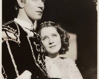 2352 George Hurrell (1904-1992) Portrait of Norma Shearer and Leslie Howard in "Romeo and Juliet," 1936 Photograph on paper From the edition of unknown size Appears unsigned; numbered in the negative lower right: "879-323"; inscribed in pencil verso: "Leslie Howard / Norma Shearer / in / 'Romeo & Juliet' / Chestnut St. Opera House / Sun. Aug. 30th - 8:30" Image: 9.375" H x 7.25" W Estimate: $200 - $300