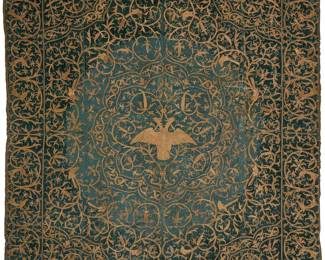 2122 A gilt metal thread embroidered green velvet panel 18th/19th century A large heavy green velvet hanging with elaborate raised gilt metal thread and corded embroidery featuring allover twined foliate arabesque tracery featuring leaves and small birds, with a central medallion of a two-headed eagle, and with woven braid passementerie fringe trim to edges and a burlap lining 89.5" H x 83.5" W approximately Estimate: $400 - $600