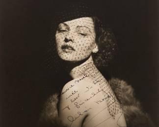 2357 George Hurrell (1904-1992) A portrait of Lilian Bond Photograph on paper From the edition of unknown size and date Signed and inscribed, presumably by the sitter, center: "To Maurice Neel / with / my best wishes / Sincerely / Lilian Bond"; a faded, barely visible, artist stamp on verso Image: 9.5" H x 7.5" W Estimate: $200 - $300