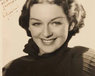 2347 George Hurrell (1904-1992) A portrait of Rosalind Russell, inscribed to Binny Barnes Photograph on paper Inscribed in ink by the sitter in the upper left: "To / Binny / not only my favorite / actress but my / favorite person / Rosalind" Sight: 12.25" H x 9.25" W Estimate: $200 - $300