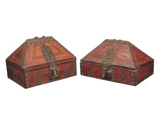2055 Two Malabar polychrome wood dowry boxes 19th century Each with brass mounts and hinged locking lid with upper handle, opening to reveal an inner side compartment 2 pieces Larger: 10.5" H x 15" W x 12.75" D; Smaller: 9.5" H x 16.25" W x 11.5" D Estimate: $300 - $500