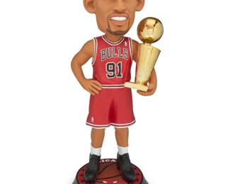 2229 A large Dennis Rodman Legends of "The Court" bobblehead Edition: 13/15 Manufactured by FOCO Titled and marked to underside: RODMAN / XMN0622-00001 / FOCO Depicting to Hall of Fame player in his red Chicago Bulls uniform with the number 91 38.75" H x 14.25" W x 15.5" D Estimate: $300 - $500
