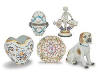 2109 A group of five German porcelain items 20th century Each with factory mark; pointer impressed: 23260 Comprising a Sitzendorf model of an English pointer (7.625" H), a Royal Porzellan Bavaria KPM Germany vase (5.875" H x 6.75" W), a Potschappel pierced plate (6.5" Dia.), a bisque figural table item (7" H x 5.75" W), and a metal-mounted painted egg box (6" H x 3.75" Dia.) 5 pieces Estimate: $300 - $500