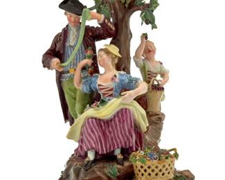 2024 A Meissen porcelain group of apple pickers Late 19th/early 20th century, after a design by Johann Joachim Kaendler and Friedrich Elias Meyer With underglaze blue crossed swords 10.25" H x 6.25" W x 6" D Estimate: $400 - $600