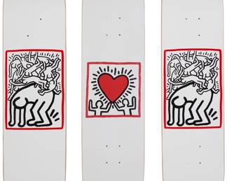 2233 Keith Haring Estate x The Skateroom Two skateboard decks of "Fight Aids," 2022 Each: Screenprint in colors on a skateboard deck Each: From the edition of unknown size Each bearing the printed "Keith Haring" signature on the top of the skateboard deck Each: 31.5" H x 8" W Untitled (Heart) Offset lithograph in colors on a skateboard deck From the edition of unknown size Bearing the printed "Keith Haring" signature on the top of the skateboard deck 31.5" H x 8" W 3 pieces Estimate: $300 - $500