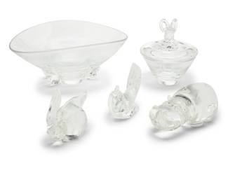 2013 Five Steuben glass table items Late 20th century Each etched: Steuben Comprising a footed bowl, ram's head candy dish, and models of a rabbit, a bird, and a hippopotamus 5 pieces Bowl: 5" H x 11.5" W x 10" D; Rabbit: 3.5" H x 3.875" W x 2.875" D Estimate: $300 - $500