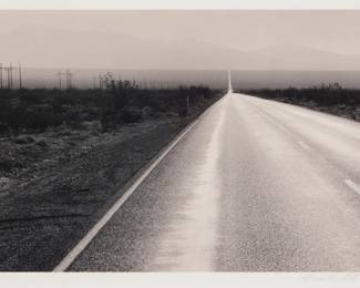 2376 Mark Citret (b. 1949) "Road to Las Vegas," 1997 Gelatin silver print on paper Edition: 3/45 (there are also 5 artist proofs) Signed and numbered in pencil in the lower margin: Mark Citret; titled and dated in ink on an artist's label affixed to the frame's backing paper Image size: 6" H x 8.5" W; Sight: 7.5" H x 9"W Estimate: $200 - $300
