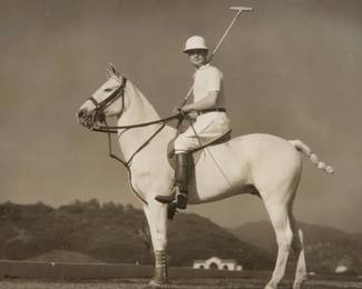 2358 George Hurrell (1904-1992) Robert Montgomery Portrait with Polo Pony Photograph on paper Embossed in the lower right margin: "Hurrell"; A stamp on the backing board: "Please credit / Hurrell / MGM" Sight: 6.75 H x 8.75" W Estimate: $200 - $300