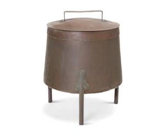 2081 A copper lidded coal bucket Early 20th century Raised on three legs 27.75" H x 22" Dia. Estimate: $300 - $500