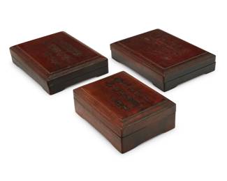 2040 Three Chinese carved wood calligraphy inkstone boxes 20th century Each incised with a poem to lid, two likely a pair 3 pieces Pair: 2" H x 8.375" W x 6.375" D; Single: 2.5" H x 6.625" W x 5" D Estimate: $200 - $300
