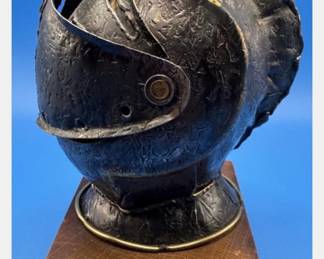 Knight helmet ashtray. https://modestlambestatesales.hibid.com/