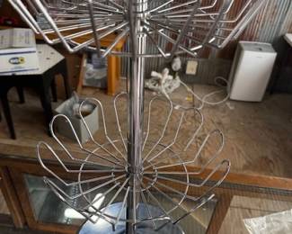 3 tier wire display rack. https://modestlambestatesales.hibid.com/