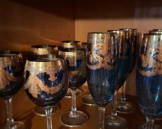 Exquisite blue crystal goblets and flutes with intricate 24k gold overlay. What a fabulous find